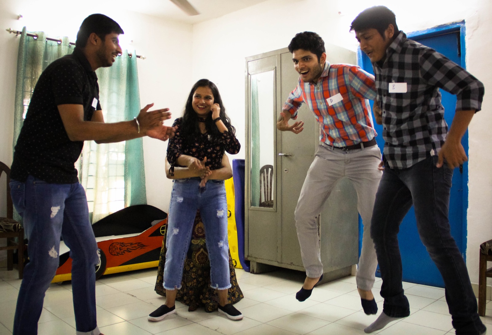 A devised scene played out on the floor while participants react